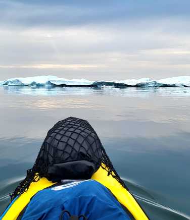 full-kayaks-heading-towards-the-ice