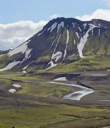 Iceland snow streaked mountain