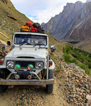 Jeep in Pakistan loaded with trekking gear