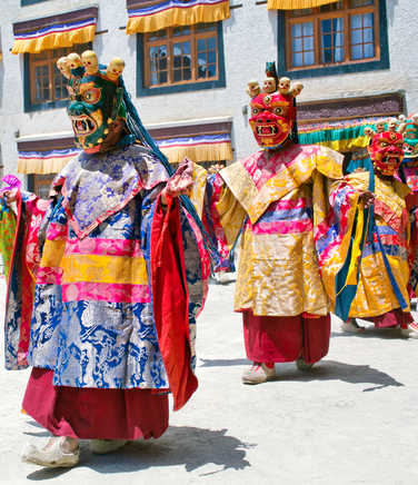 Masked-dancers-celebrating-Phyang-Tsedup