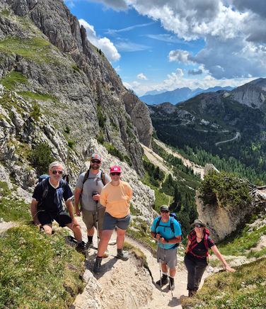 smiling-team-at-the-top-of-the-pass