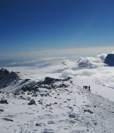 Treking on Kilimanjaro plateau, between clouds and snow
