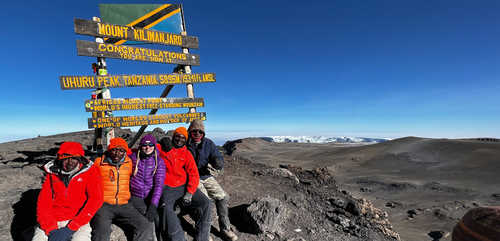 Hikers at the summit of Kilimanjaro