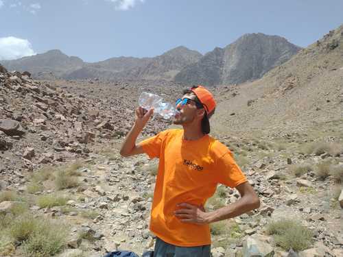 Omar-the-guide-having-a-quick-drink-near-Lac-D'Ifni