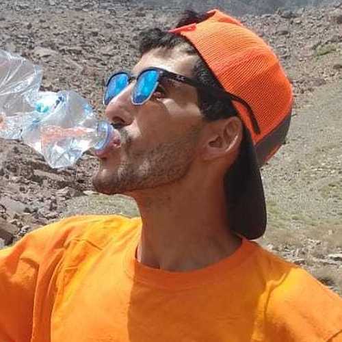 Our-guide-Omar-staying-hydrated-in-Morocco