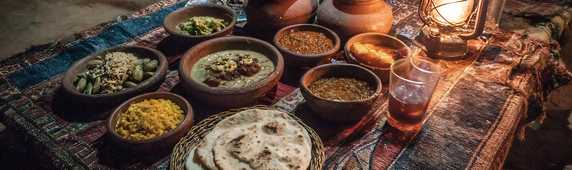 Table laid with traditional Pakistani food