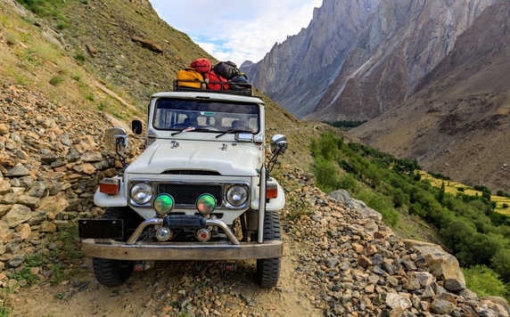 Jeep in Pakistan loaded with trekking gear