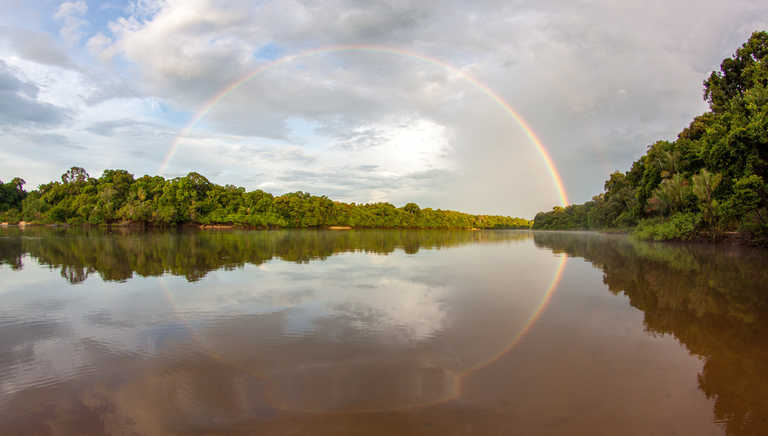 Essequibo-river-flowing-beneath-a-rainbow