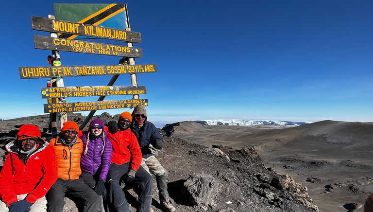 Hikers at the summit of Kilimanjaro