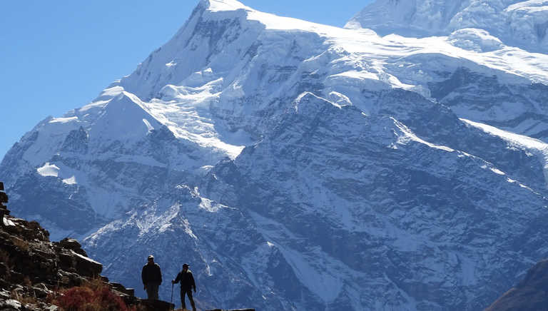 Silhouette of hikers in Annapurnas II