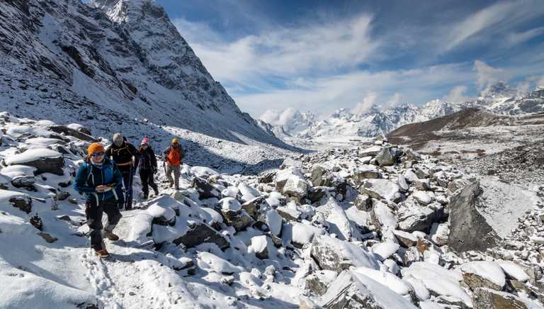 trekking-on-snowy-mountain-path