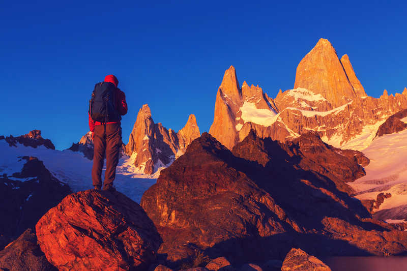 Hiker at sunrise in El Chalten National Park - © Hiker at sunrise in El Chalten National Park