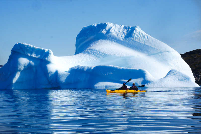 Sea kayaking among icebergs © Sea kayaking among icebergs