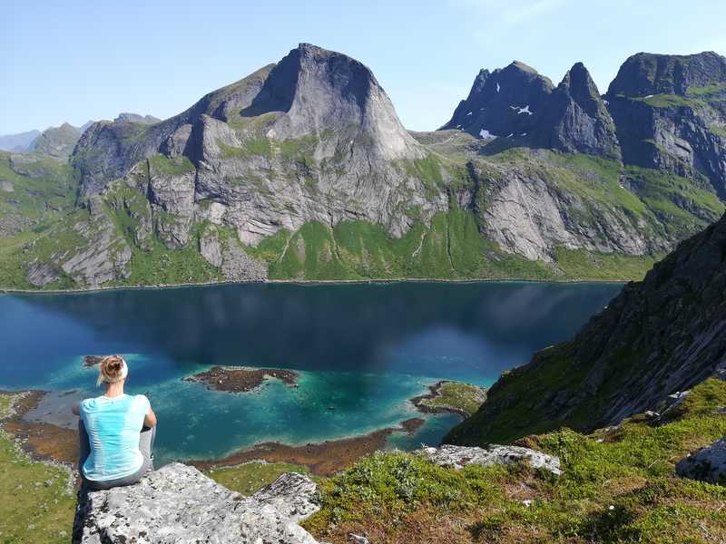 Hiker contemplating the view in the Lofoten